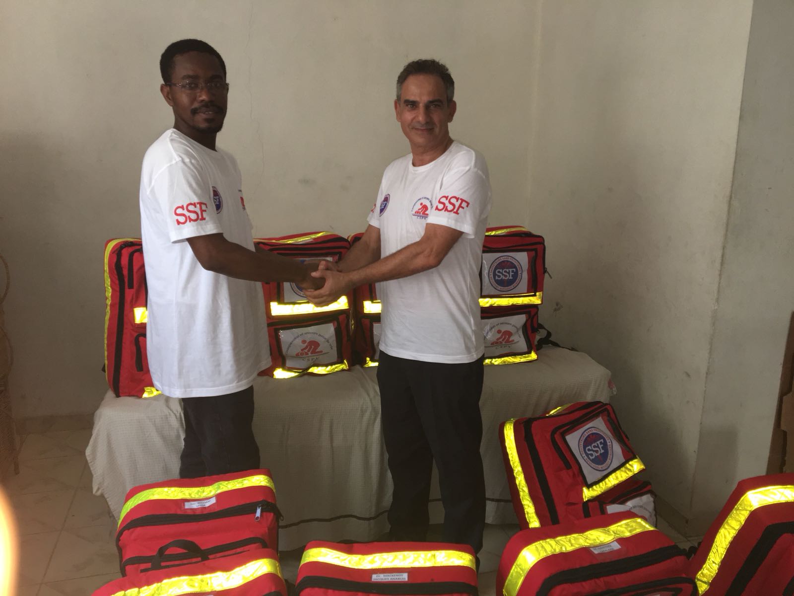 Giving away first aid kits, Port-au-Prince, July 08, 2018